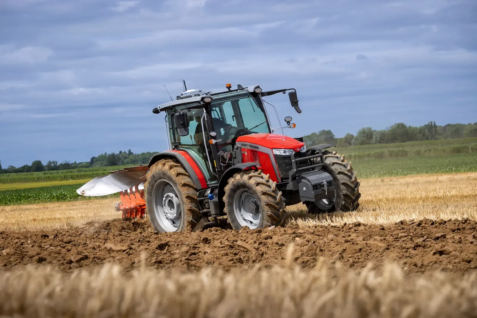 Massey Ferguson tractor ploughing a commercial field