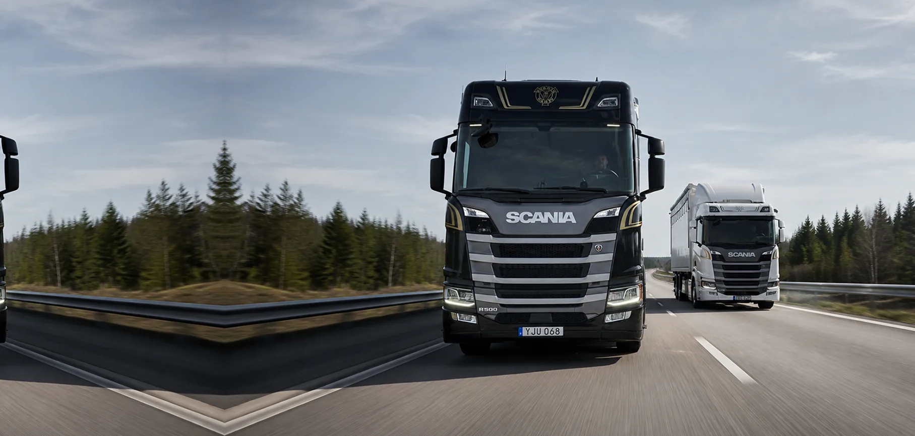 Scania commercial trucks operating on a highway
